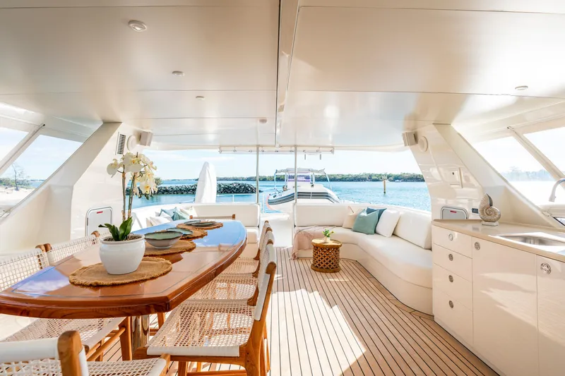 Texas T Yacht Photos Pics Luxurious 2009 Custom Sulis Marine Expedition Yacht interior with elegant dining and seating area.