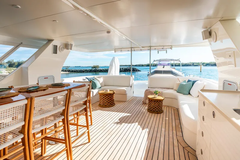Texas T Yacht Photos Pics Luxurious 2009 Sulis Marine Expedition Yacht interior with elegant seating and ocean view.