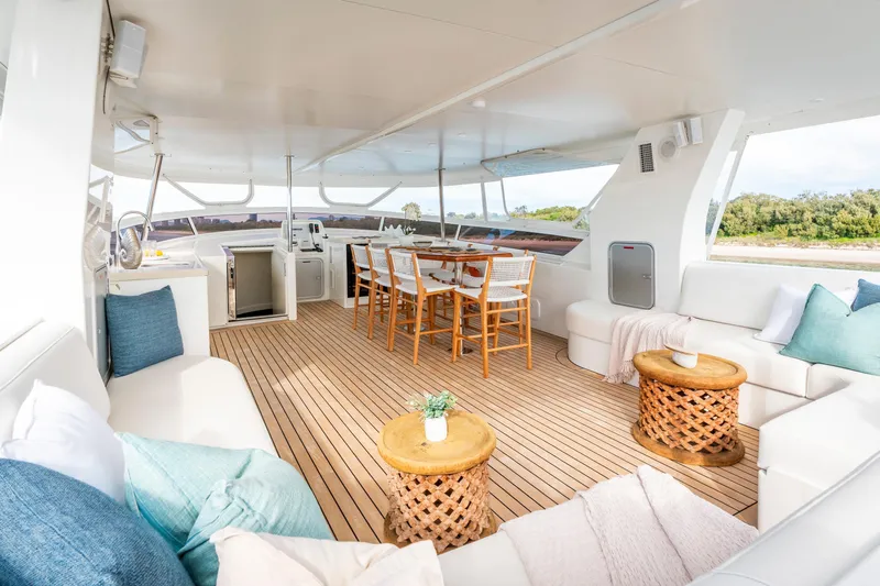 Texas T Yacht Photos Pics Luxurious 2009 Custom Sulis Marine Expedition Yacht interior with elegant seating and dining area.