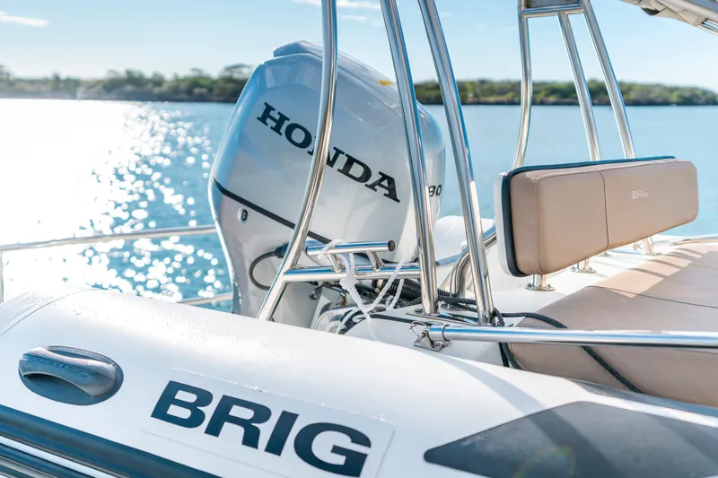 Texas T Yacht Photos Pics Custom Sulis Marine Expedition Yacht, 2009, with Honda engine and Brig seating on sunny waters.