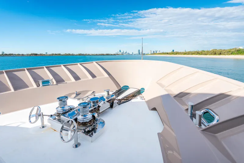 Texas T Yacht Photos Pics Custom 2009 Sulis Marine Expedition Yacht deck with ocean and city skyline view.