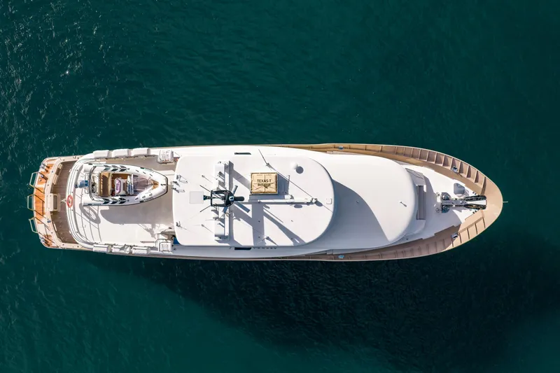 Texas T Yacht Photos Pics Aerial view of 2009 Custom Sulis Marine Expedition Yacht on blue water.