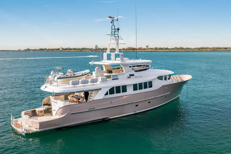 Texas T Yacht Photos Pics Custom 2009 Sulis Marine Expedition Yacht on serene blue waters.