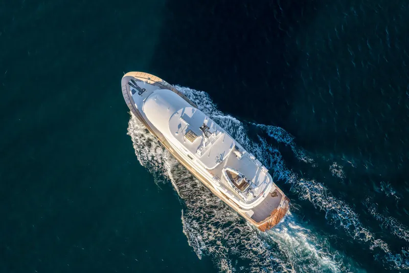 Texas T Yacht Photos Pics Aerial view of 2009 Custom Sulis Marine Expedition Yacht cruising in deep blue waters.
