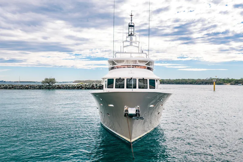 Texas T Yacht Photos Pics Front view of 2009 Custom Sulis Marine Expedition Yacht on calm water.