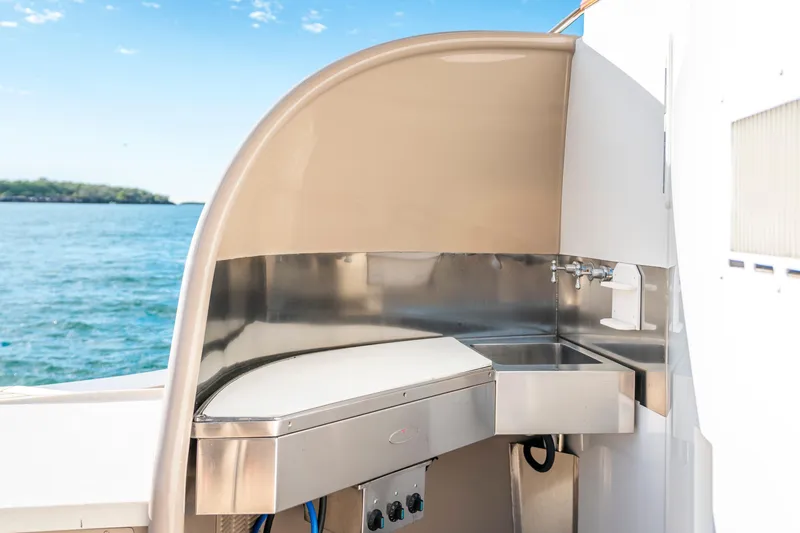Texas T Yacht Photos Pics Outdoor sink area on 2009 Custom Sulis Marine Expedition Yacht, with ocean view.