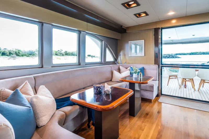 Texas T Yacht Photos Pics Luxurious interior of 2009 Custom Sulis Marine Expedition Yacht with elegant seating and scenic views.