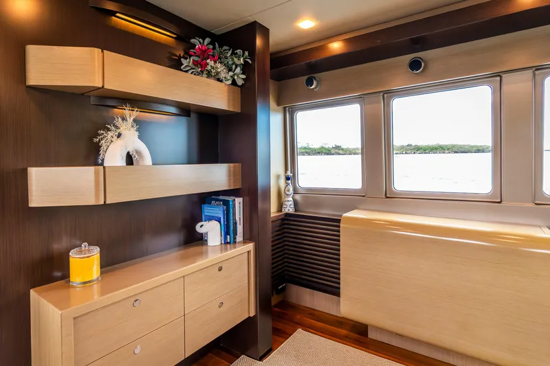 Texas T Yacht Photos Pics Luxurious interior of 2009 Custom Sulis Marine Expedition Yacht with elegant wood finishes and decor.