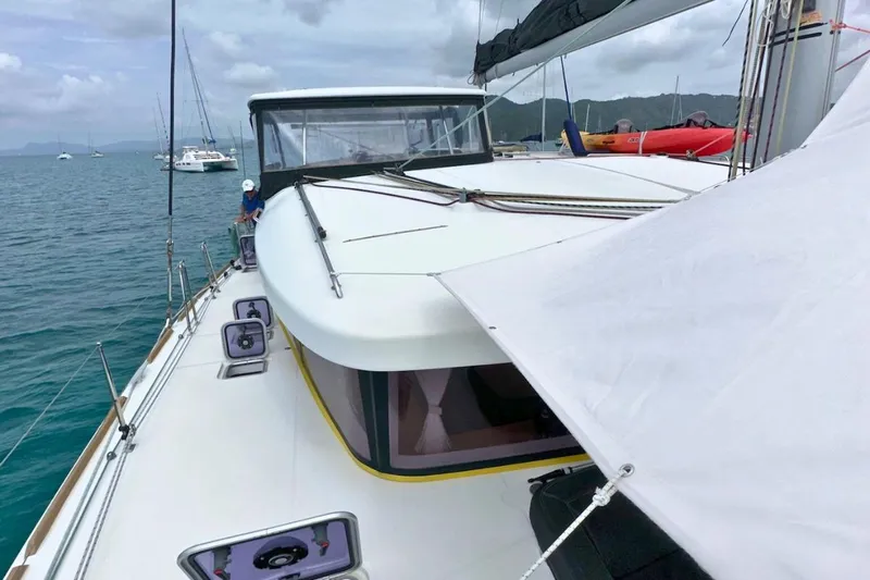 Sixtus Yacht Photos Pics 2016 Lagoon 450 s catamaran on calm waters with visible deck and sails.