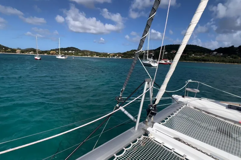 Sixtus Yacht Photos Pics Sailing on a 2016 Lagoon 450 s catamaran in a scenic coastal bay.