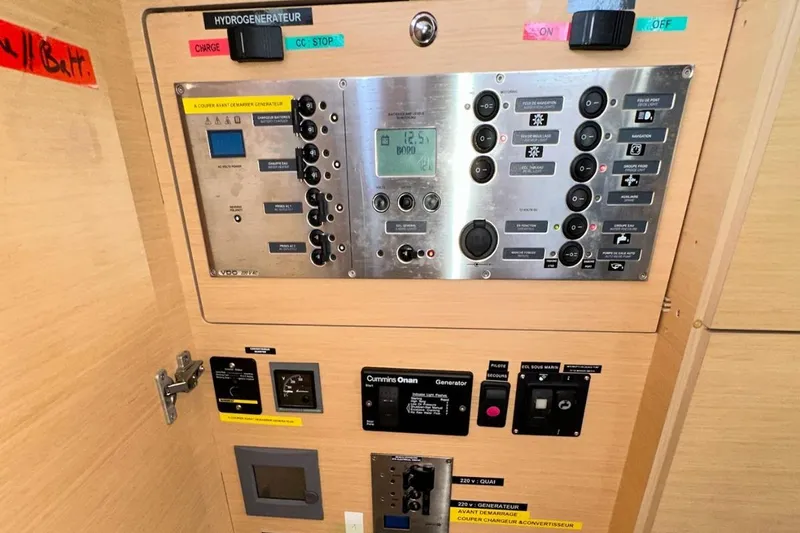 Sixtus Yacht Photos Pics Control panel of a 2016 Lagoon 450 s yacht, featuring various switches and displays.