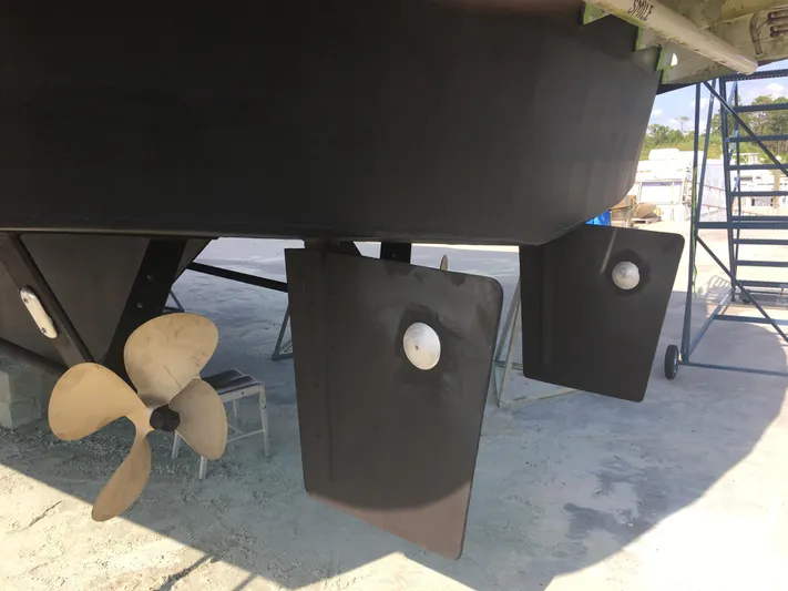 Sweet Freedom Yacht Photos Pics Underside of 1984 Broward CPMY with propeller and rudder.