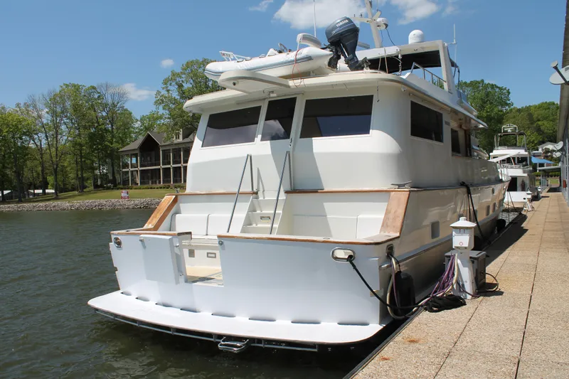 Sweet Freedom Yacht Photos Pics 1984 Broward CPMY yacht docked on a sunny day.