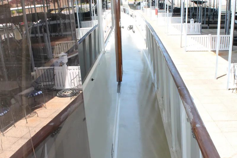 Sweet Freedom Yacht Photos Pics Walkway of 1984 Broward CPMY at the dock.