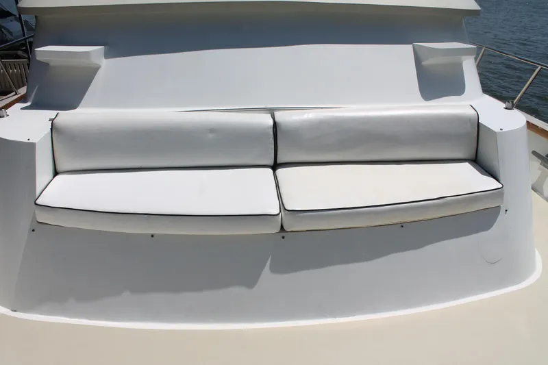Sweet Freedom Yacht Photos Pics White seating on a 1984 Broward CPMY yacht.