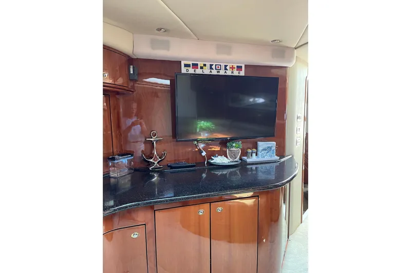  Yacht Photos Pics Luxurious interior of 2003 Sea Ray 550 Sundancer yacht with TV and decor.