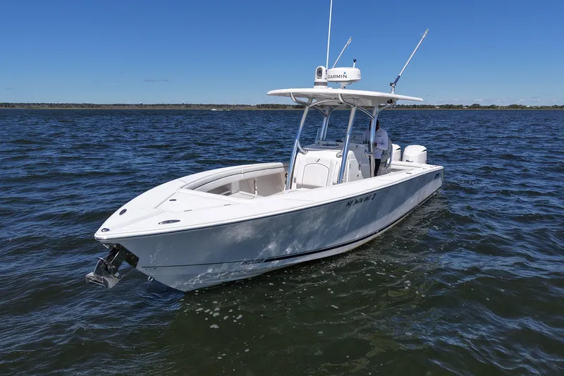  Yacht Photos Pics 2014 Jupiter 30 FS boat on open water under clear blue sky.