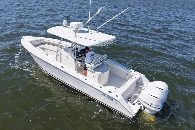  Yacht Photos Pics 2014 Jupiter 30 FS boat cruising on open water with dual Yamaha engines.