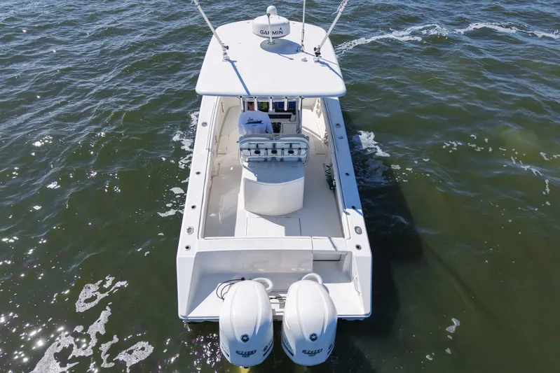  Yacht Photos Pics 2014 Jupiter 30 FS boat on water, aerial view, twin engines visible.