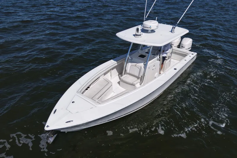  Yacht Photos Pics 2014 Jupiter 30 FS boat on open water, featuring sleek design and modern equipment.