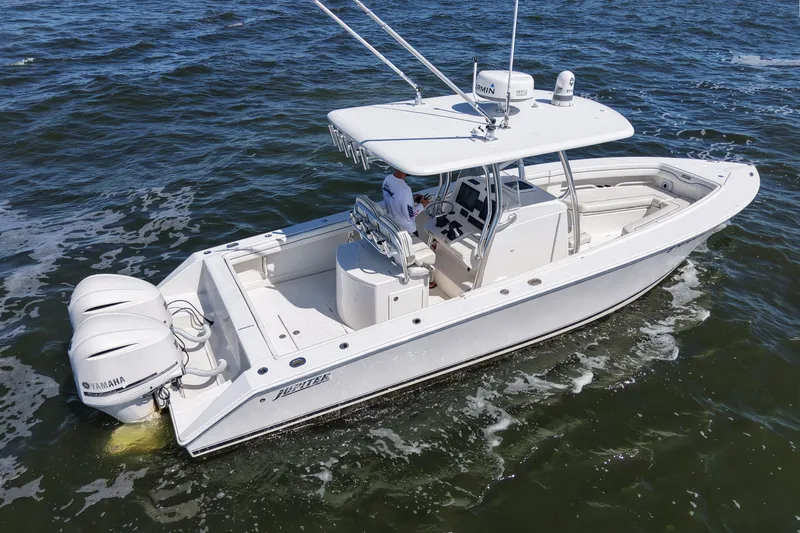  Yacht Photos Pics 2014 Jupiter 30 FS boat with twin Yamaha engines cruising on the water.