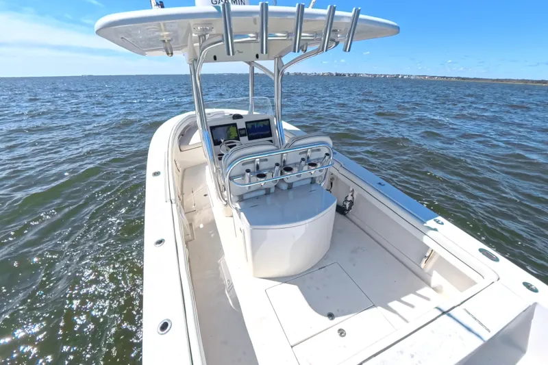  Yacht Photos Pics 2014 Jupiter 30 FS boat on open water, featuring a sleek design and modern console.
