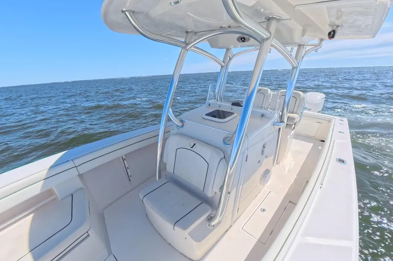  Yacht Photos Pics 2014 Jupiter 30 FS boat on open water, featuring sleek design and spacious deck.