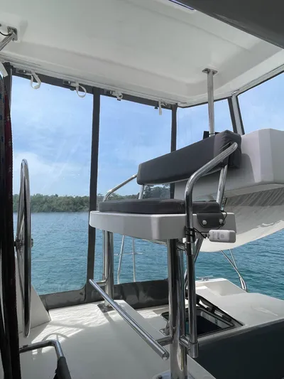 Cynthia Mae Yacht Photos Pics 2018 Leopard 45 yacht helm with ocean view and modern seating.