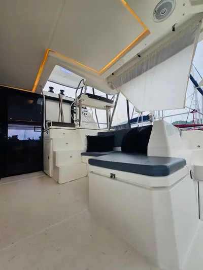 Cynthia Mae Yacht Photos Pics Modern 2018 Leopard 45 yacht interior with seating and helm station.