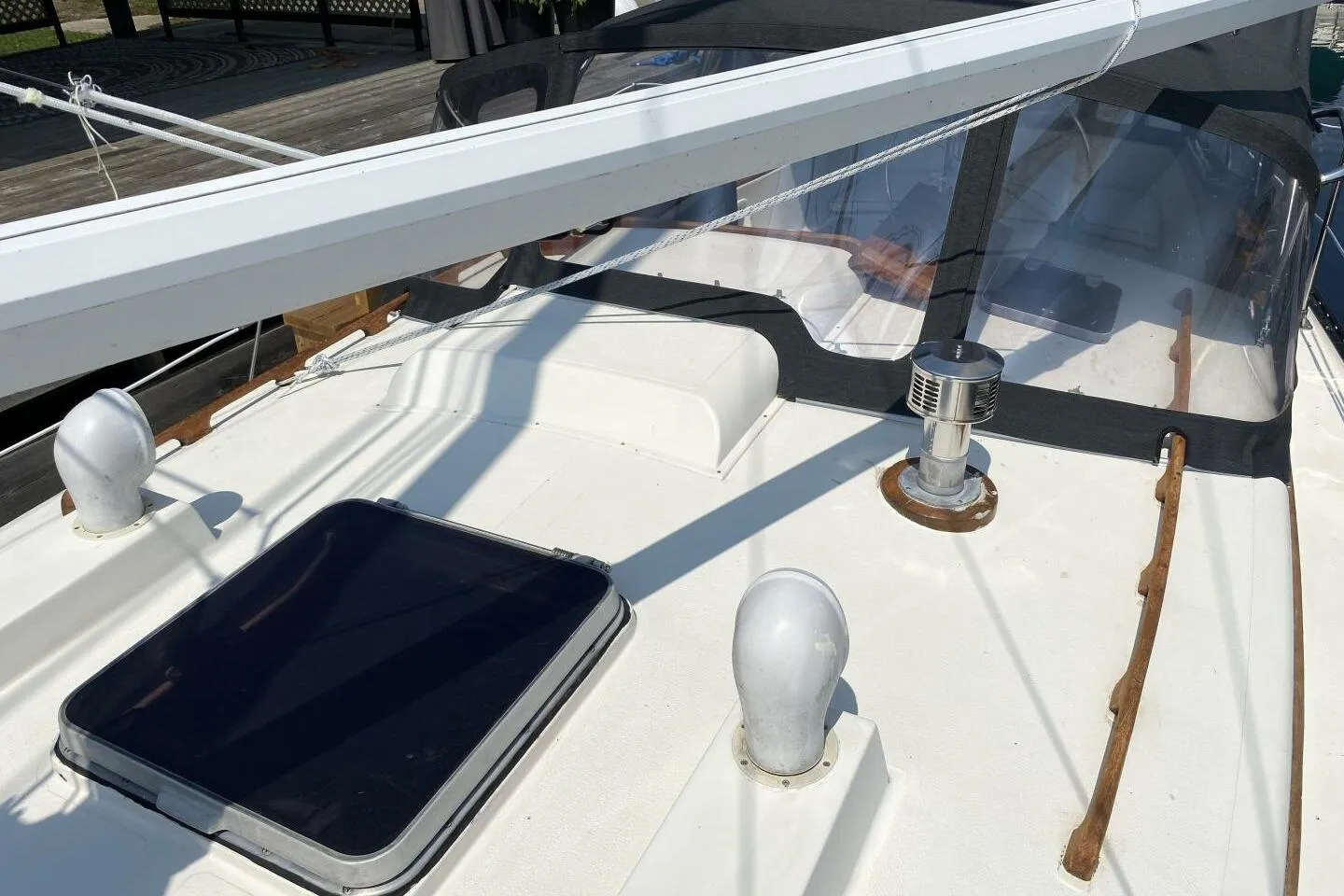 1984 Aloha 34 sailboat deck with hatch, winch, and rigging details.