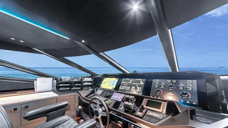 Contessa Yacht Photos Pics 2024 Sunseeker 100' Yacht cockpit with advanced navigation systems and ocean view.