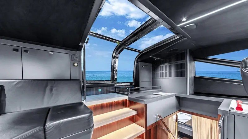 Contessa Yacht Photos Pics Luxurious interior of 2024 Sunseeker 100' Yacht with ocean view and modern design.