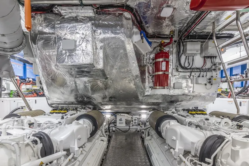 Contessa Yacht Photos Pics Engine room of 2024 Sunseeker 100' Yacht, showcasing advanced machinery and equipment.
