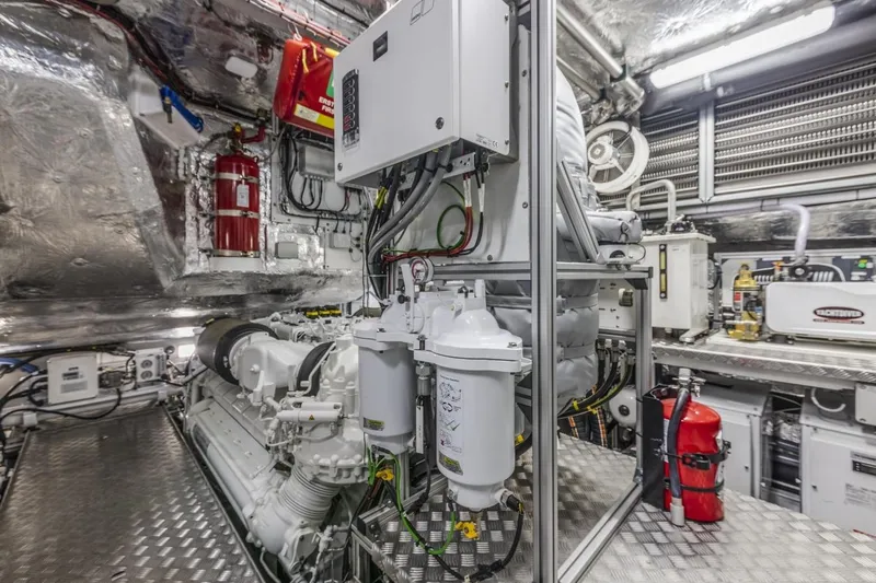 Contessa Yacht Photos Pics Engine room of 2024 Sunseeker 100' Yacht, featuring advanced machinery and safety equipment.