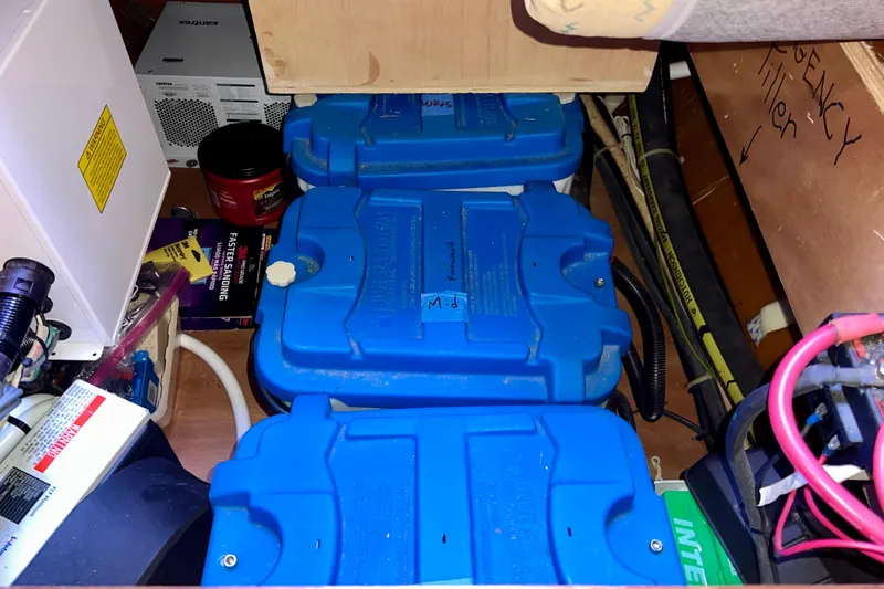 Still Got It Yacht Photos Pics Electrical components and blue battery boxes inside a 2002 Lagoon 380 catamaran.