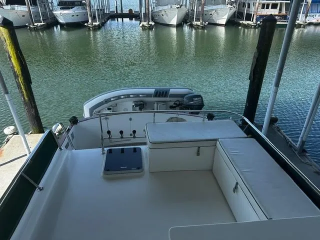 Westwind Yacht Photos Pics 2004 Westcoast 46 yacht with spacious deck, docked in marina.