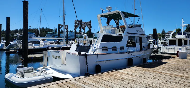 Westwind Yacht Photos Pics 2004 Westcoast 46 yacht docked at marina, sunny day, clear blue sky.
