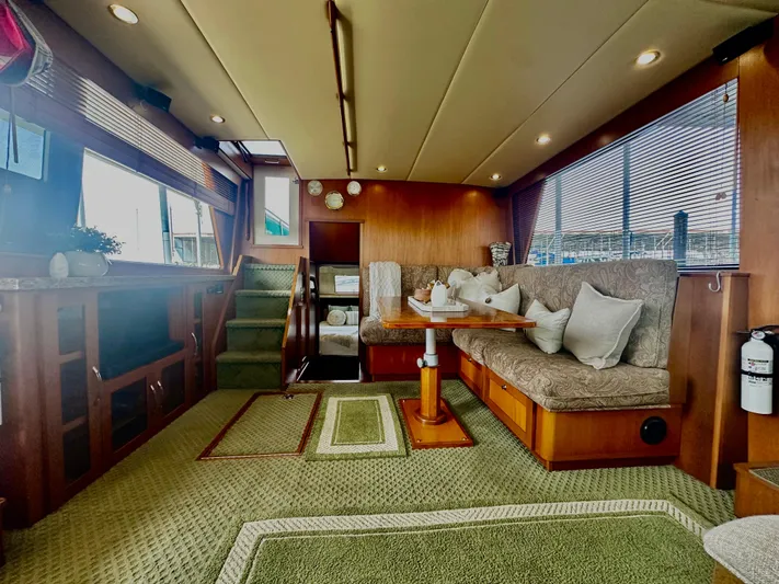 Westwind Yacht Photos Pics Luxurious interior of a 2004 Westcoast 46 yacht with plush seating and elegant decor.