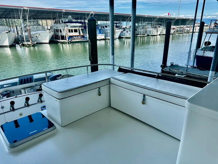 Westwind Yacht Photos Pics 2004 Westcoast 46 yacht deck with seating, docked at marina with multiple boats.