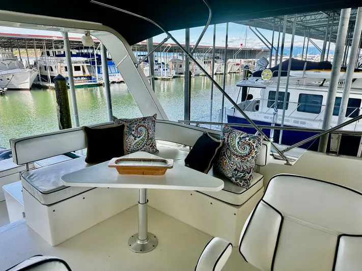 Westwind Yacht Photos Pics Luxurious 2004 Westcoast 46 yacht interior with elegant seating and marina view.