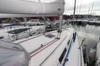 2007 Dufour 40 Performance sailboat docked in a marina, showcasing deck and rigging.
