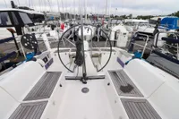 2007 Dufour 40 Performance sailboat cockpit with dual steering wheels at marina.
