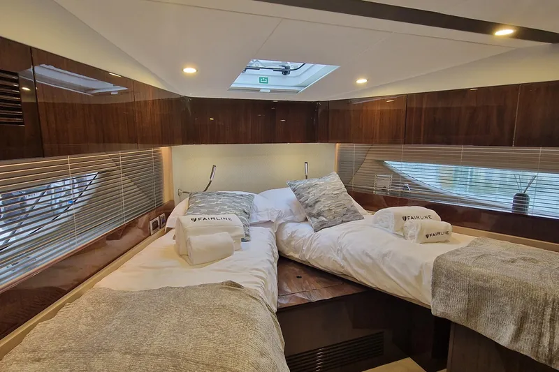 Volvo Ips & Dps Yacht Photos Pics Luxurious cabin interior of 2024 Fairline Targa 45 Open yacht with twin beds.