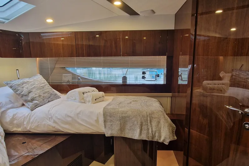 Volvo Ips & Dps Yacht Photos Pics Luxurious interior of 2024 Fairline Targa 45 Open yacht cabin with elegant wood finishes.
