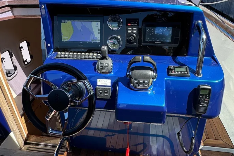  Yacht Photos Pics Control panel of a 2017 Fjord 36' Open boat with navigation equipment.