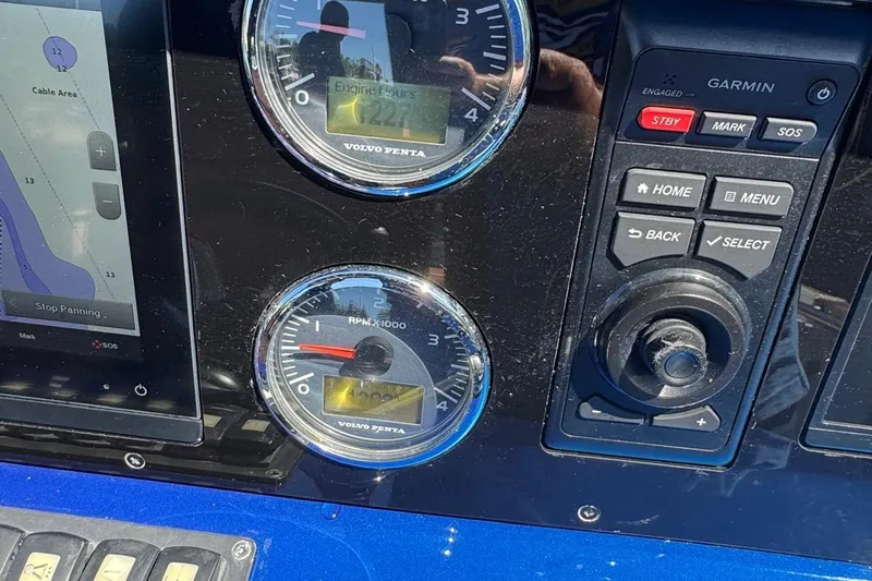  Yacht Photos Pics Control panel of a 2017 Fjord 36' Open boat with Garmin navigation system.