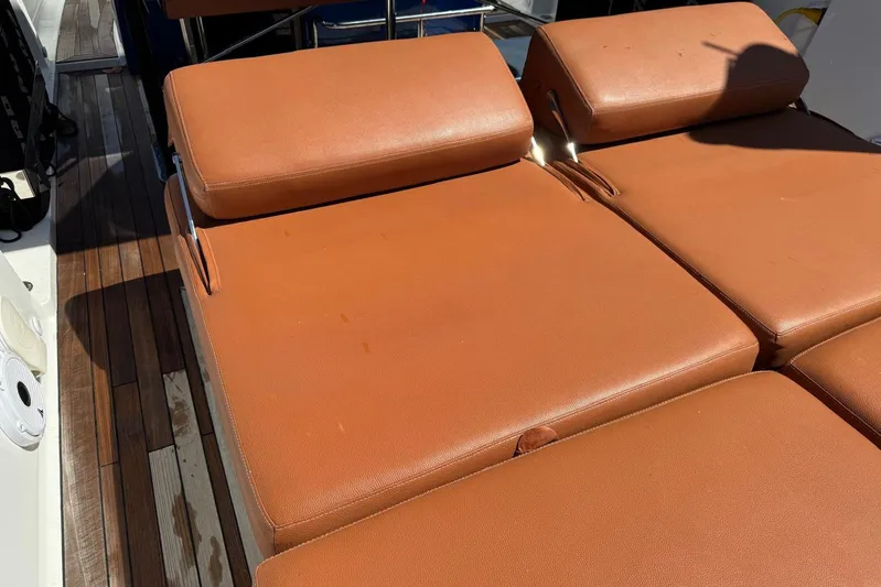  Yacht Photos Pics Brown leather seating on 2017 Fjord 36' Open yacht deck.