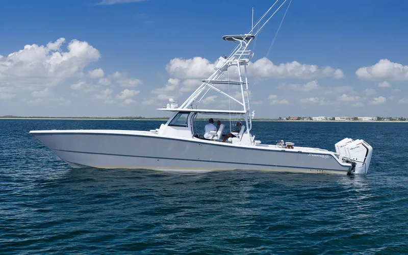  Yacht Photos Pics 2022 Freeman 47 boat on open water under clear blue sky.