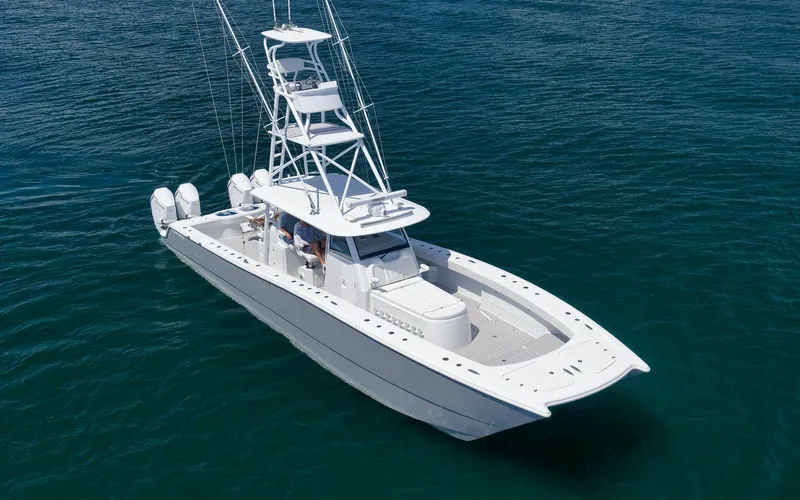  Yacht Photos Pics Freeman 47 boat, 2022 model, cruising on clear blue water.