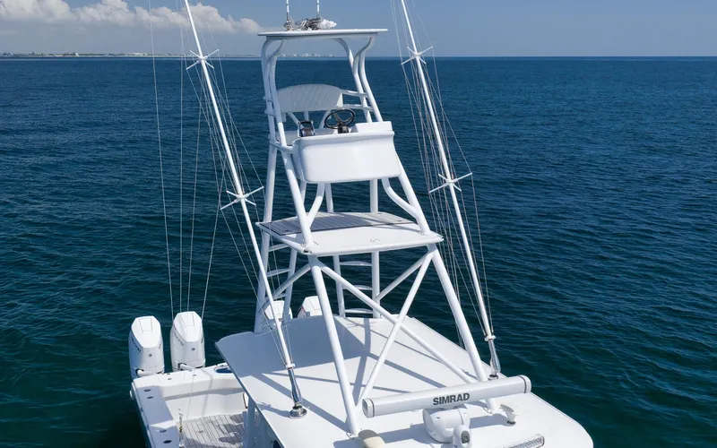  Yacht Photos Pics Freeman 47 boat, 2022 model, with tower and ocean backdrop.